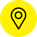 A yellow circle with an outline of a pin